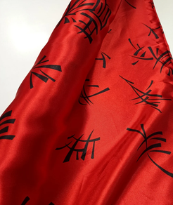 Tela de raso Carnaval oriental rojo (1,5 m)