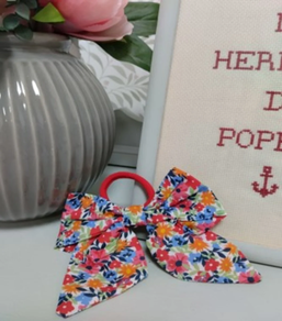 Coletero de tela en forma de lazo