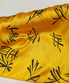 Tela de raso Carnaval oriental amarillo (0,5 m)