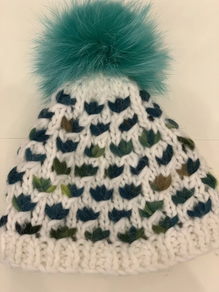 Artilezko txanoa Merino ehun lodia eskuz Oinarri gordina eta berdez jaspeatua Pompon larrua kendu eta jartzeko.