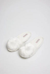 ZAPATILLAS POMPÓN DESTALONADAS