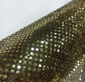 Tela de lentejuelas Carnaval dorado fondo oscuro (0,5 m)